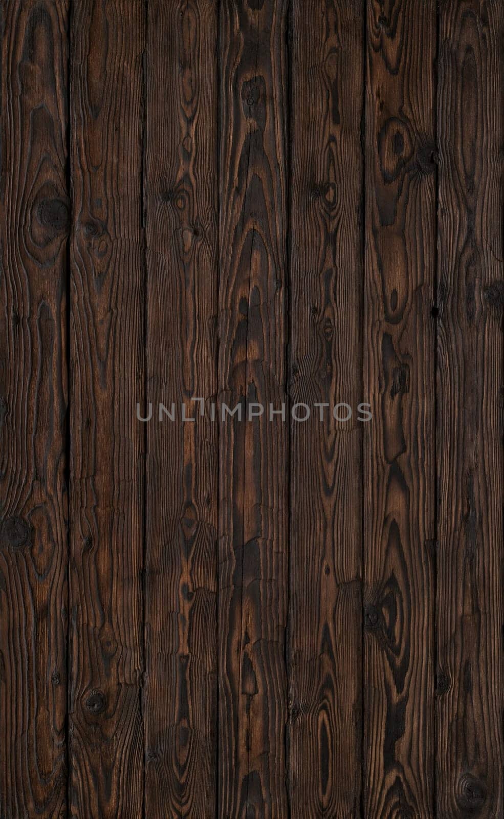 Old wood dark brown burned board, texture and background