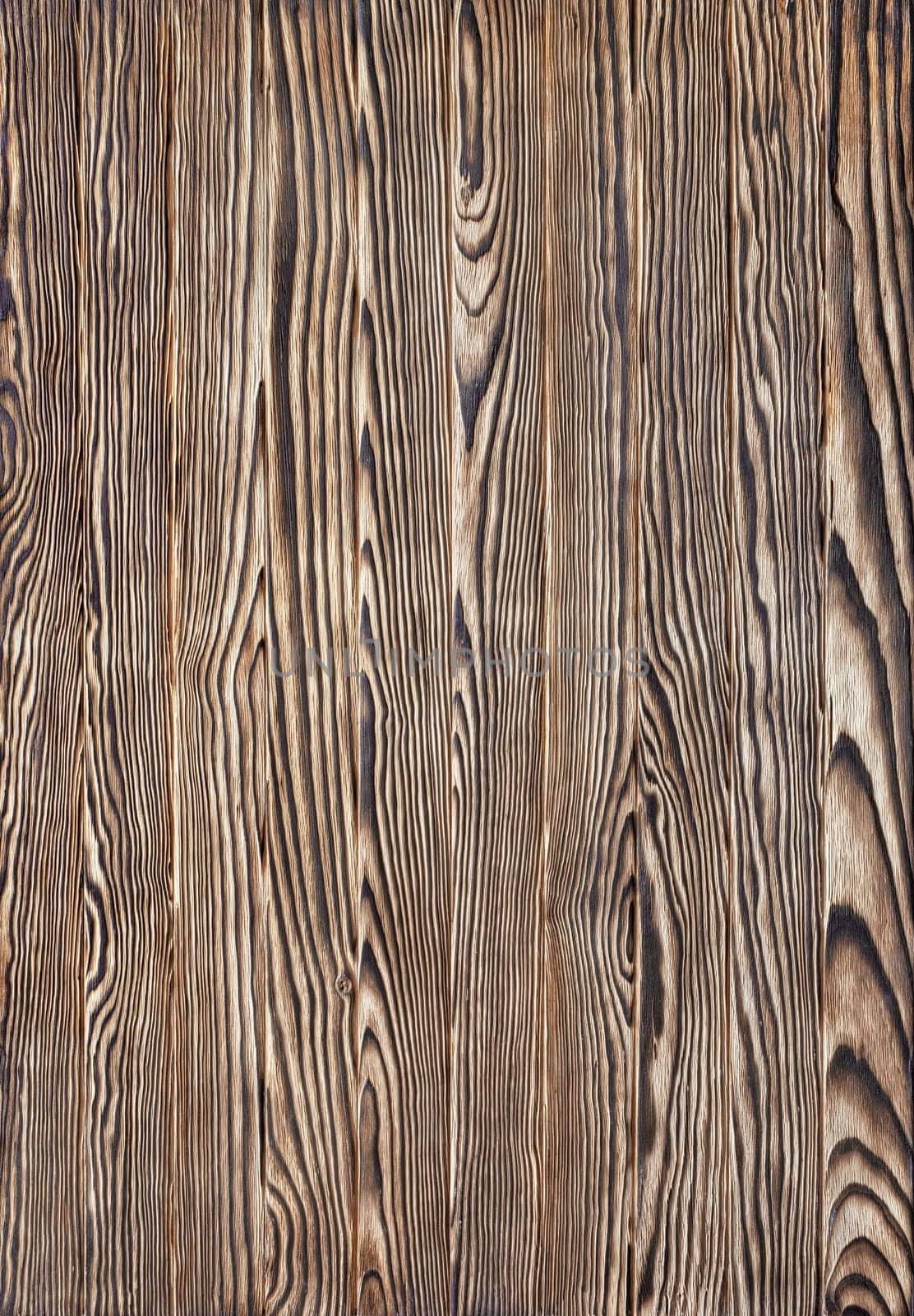 Old wood brown burned plank board of pine tree, texture and background