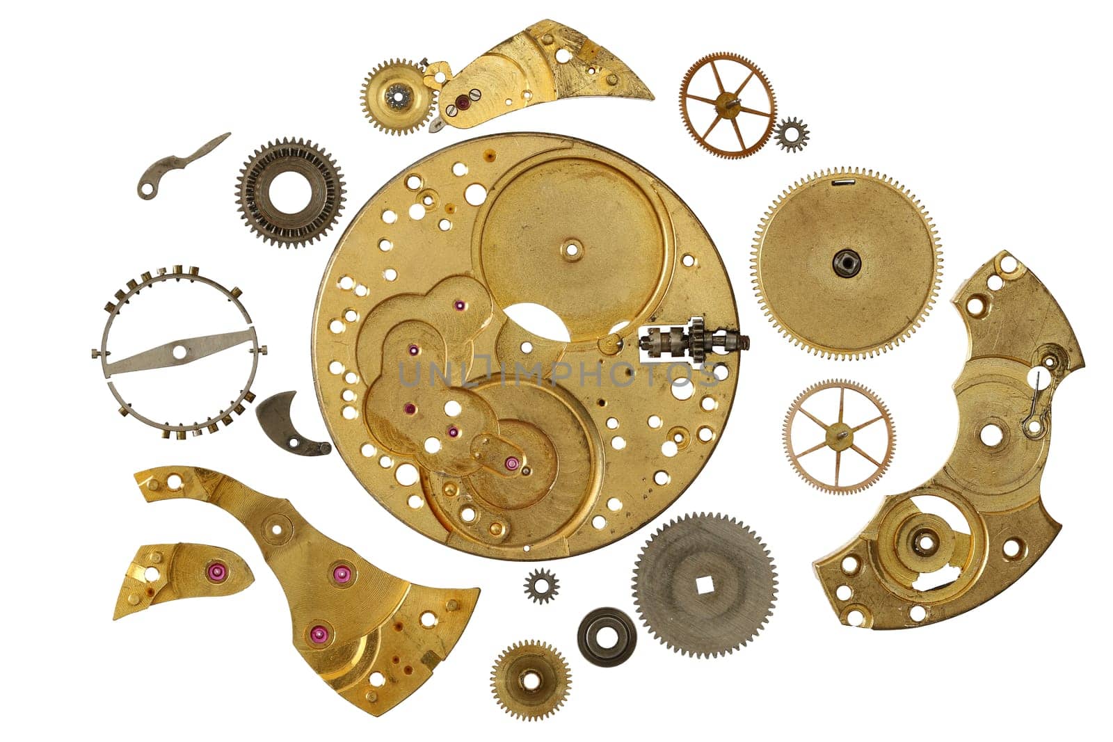 Disassembled clockwork mechanism - various part of clockwork mechanism on white background