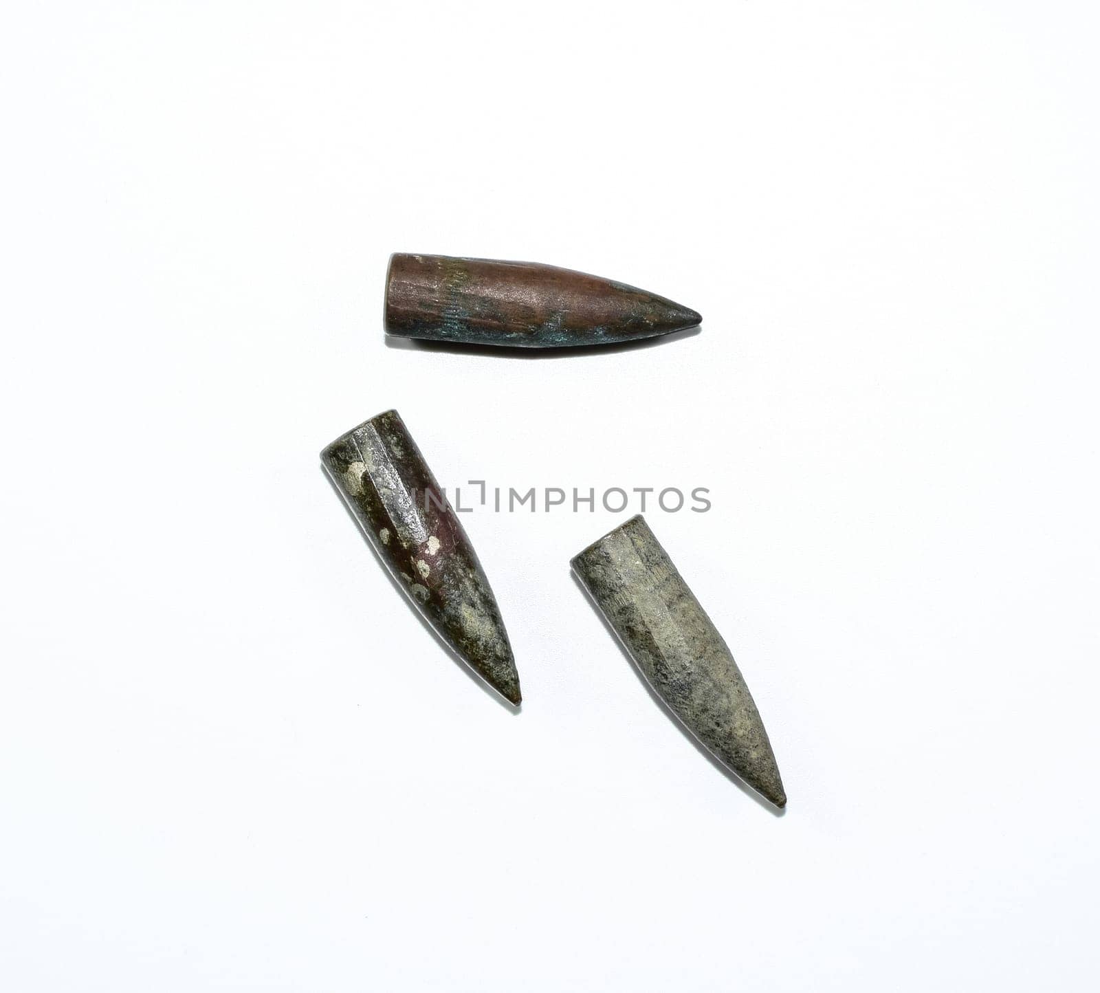 Old rusty bullets from a Kalashnikov assault rifle.