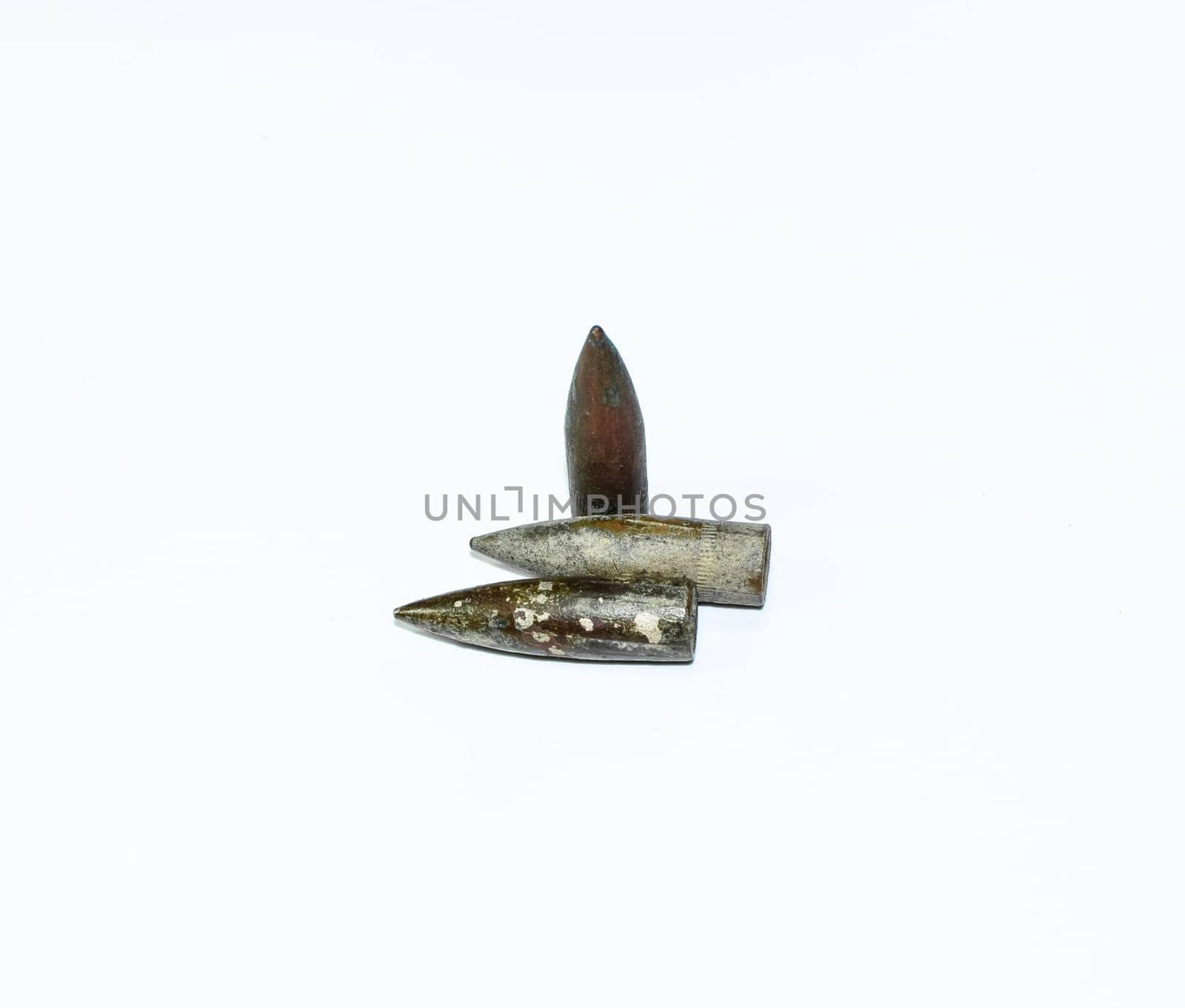 Old rusty bullets from a Kalashnikov assault rifle.