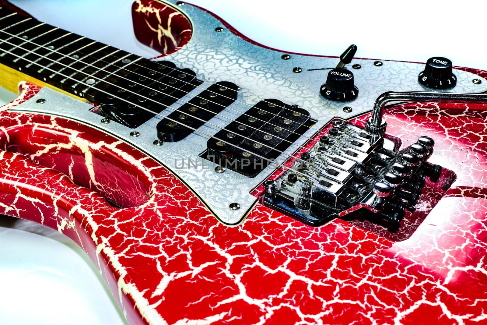 Electric guitar on a white background. A musical instrument.