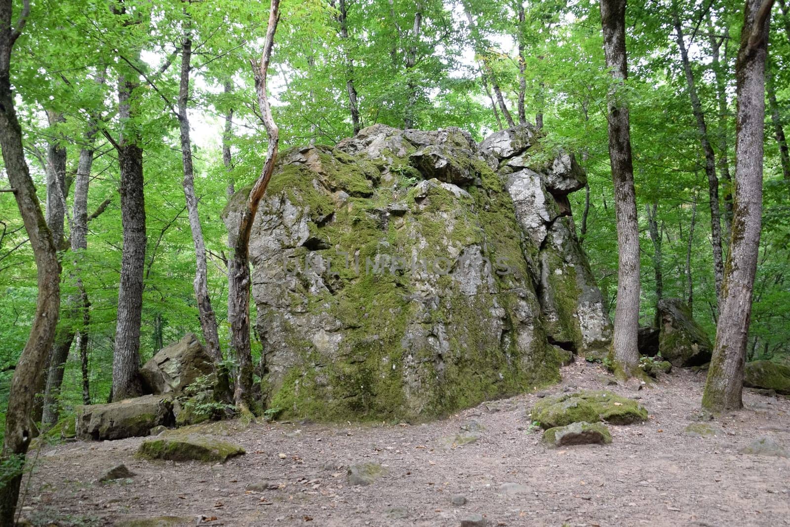 The rock is a bloody finger. Landmark in the Shapsugi Forest.