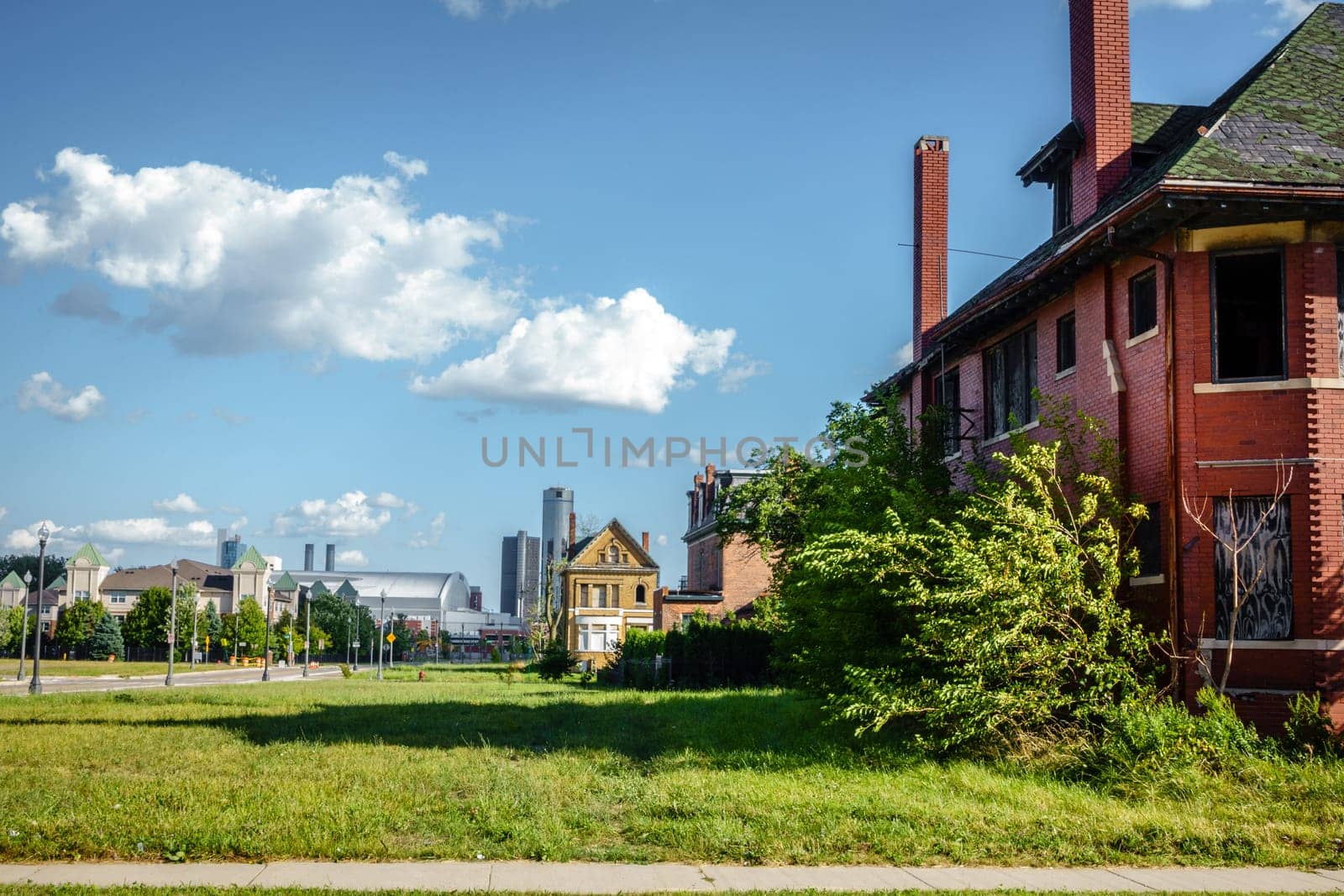 Skyscrapers of Detroit downtown are seen behind an old and neglected neighborhood