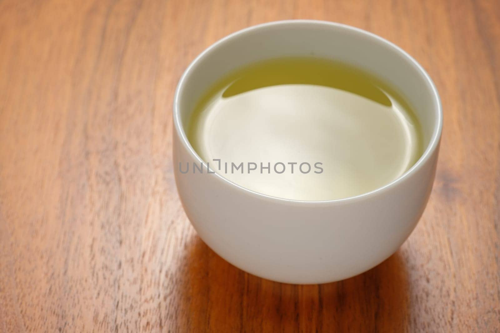 Cup of green tea close-up
