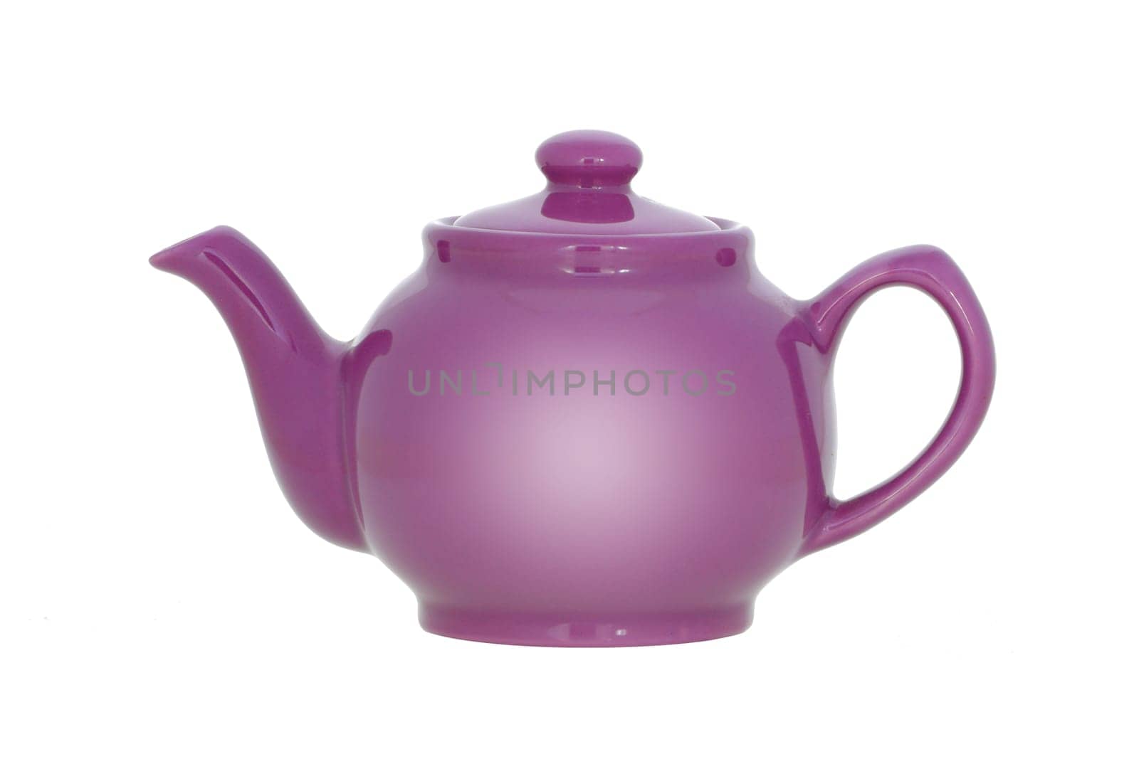 Pink English teapot isolated on a white background