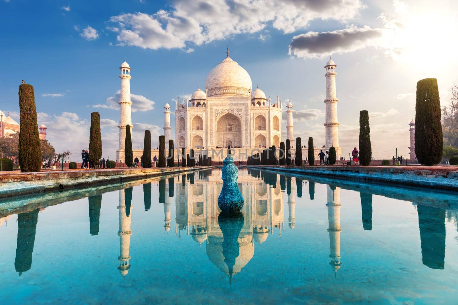Taj Mahal and its reflection, famous view of India, Agra.