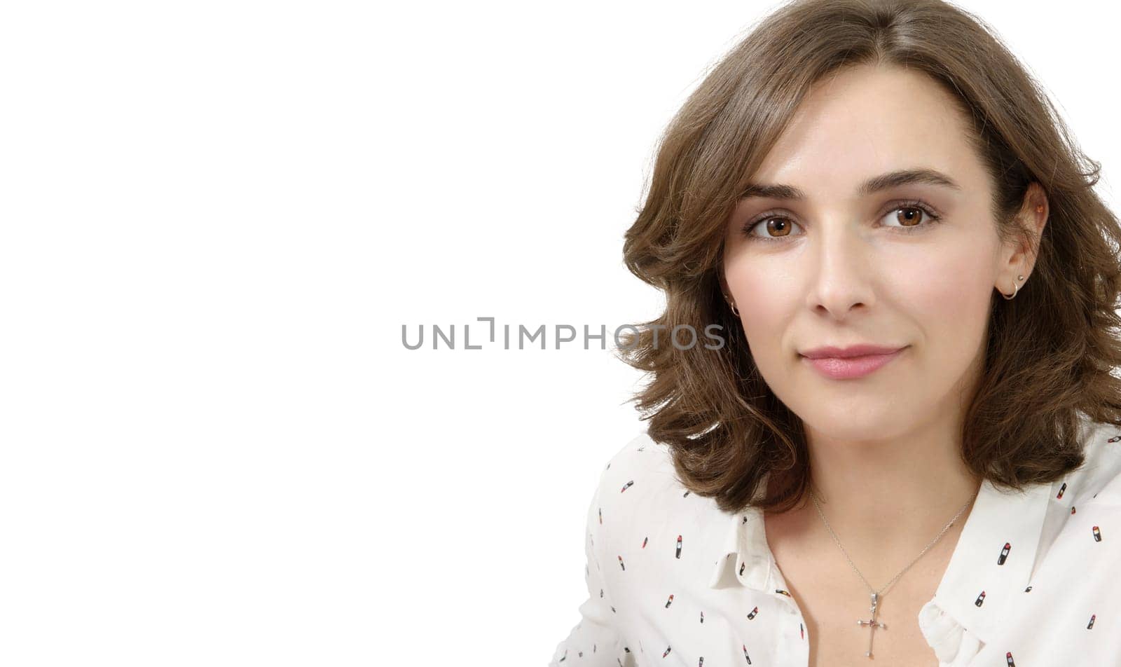 Beautiful woman face close up isolated on white background