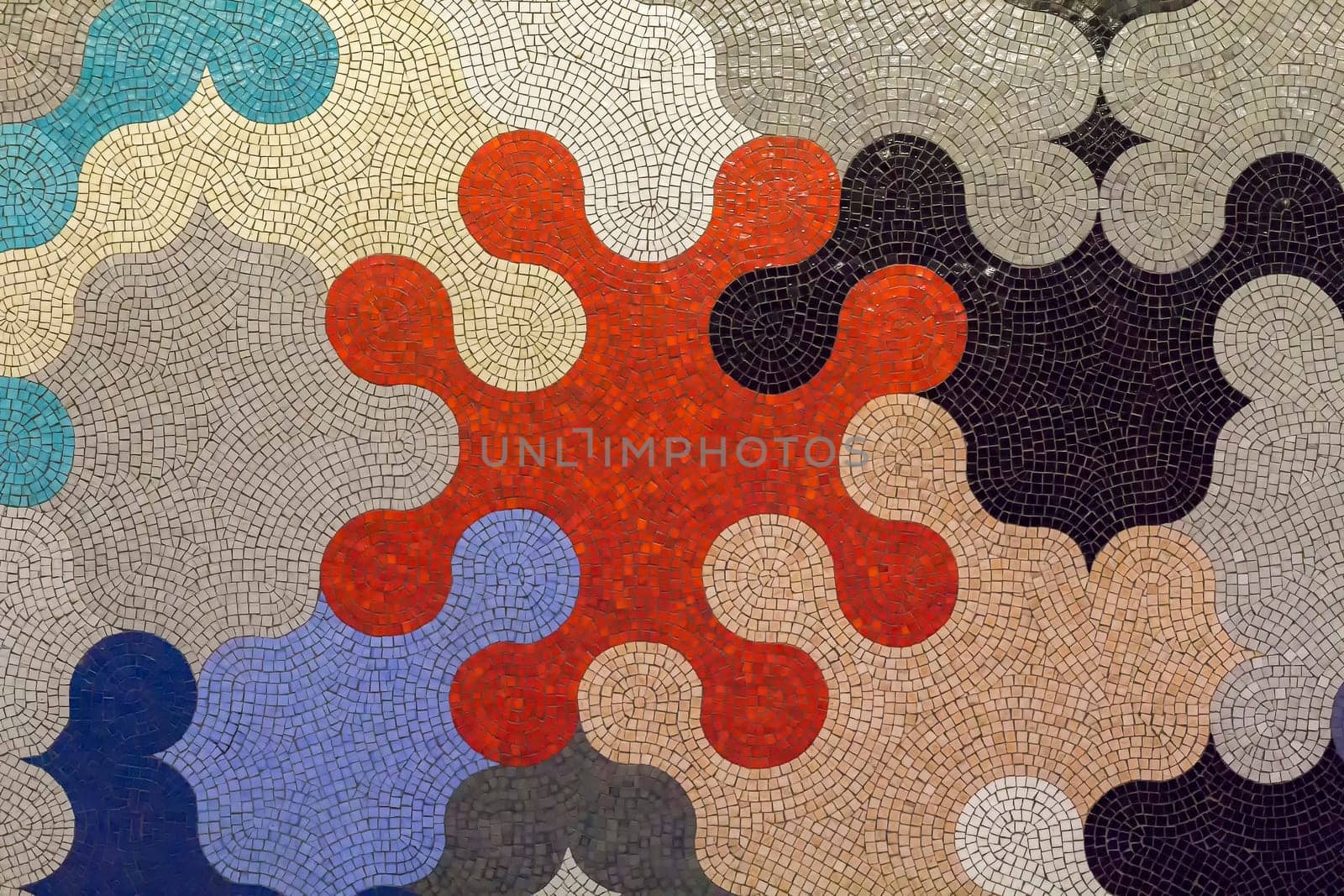 Modern ceramic mosaic in puzzle shapes with many colors