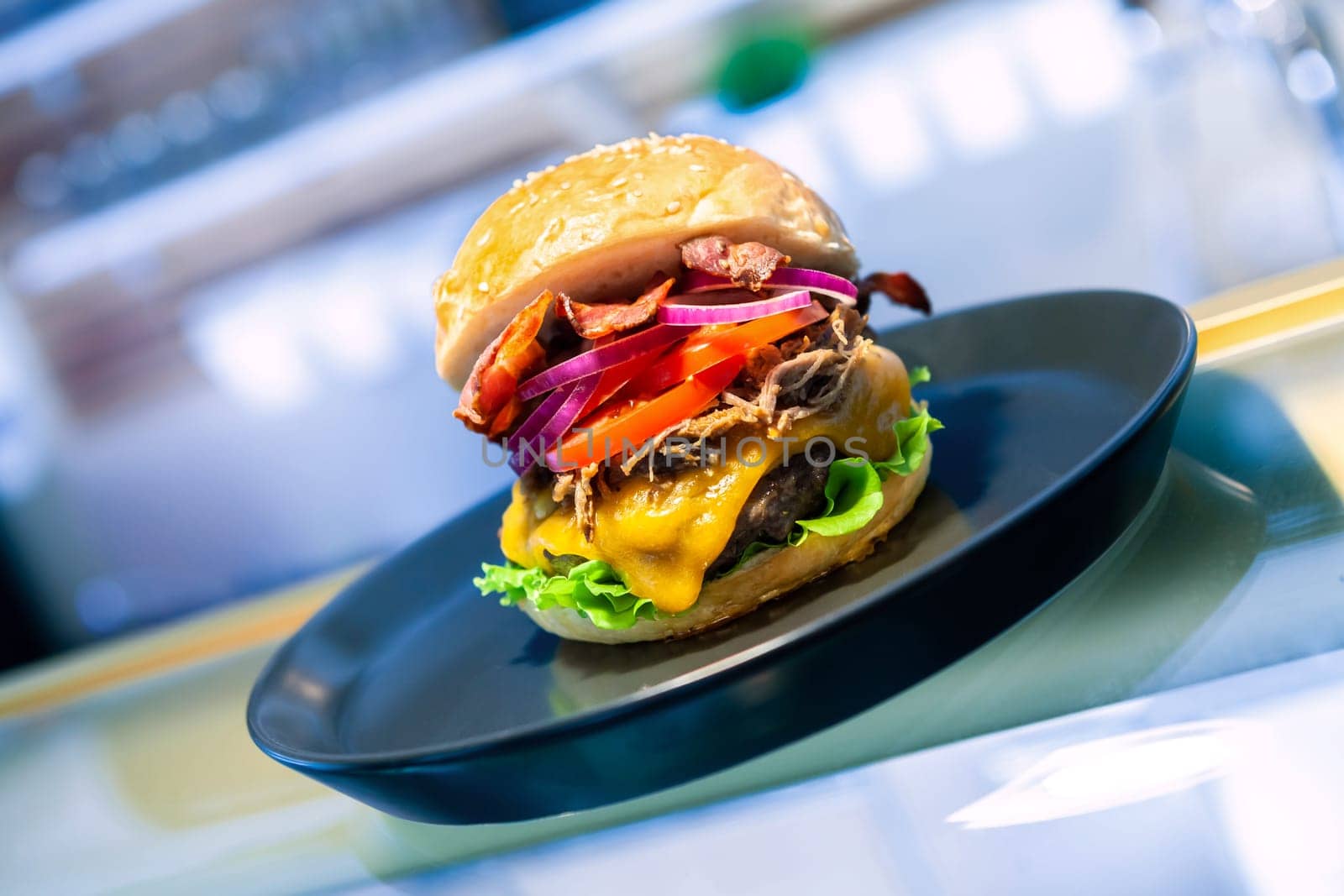 Close-up of home made tasty burgers on plate in restaurant. detail shot