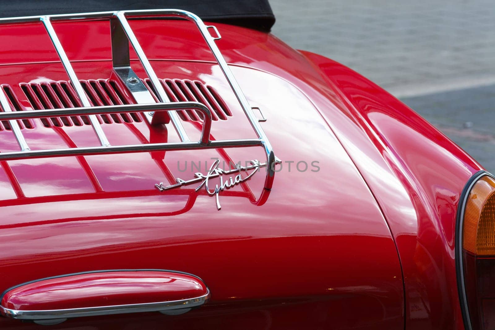 HEILIGENHAUS, NRW, GERMANY - SEPTEMBER 10, 2017:.Heiligenhaus, Nrw, Germany - September 10, 2017:.Vintage Volkswagen Karmann Ghia car rear view in red, parked in Heiligenhaus, Germany.