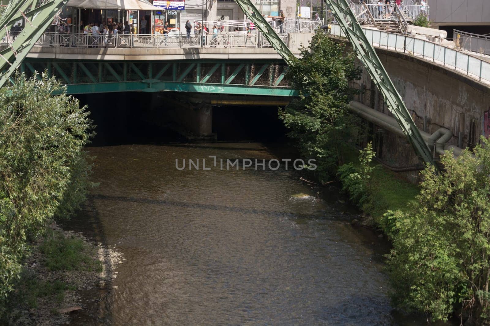 WUPPERTAL  NRW  GERMANY - JULY 31  2017:.Wuppertal  Nrw  Germany - July 31  2017:.The supporting framework of the Wuppertaler suspension railway consists of a steel framework with inclined supports and suspended steel bridges so-called Rieppelträger.