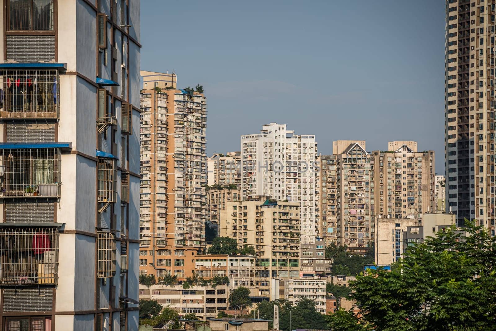 Chongqing, China -  August 2019 :  Highrise hillside residential apartments and buildings  in Chongqing city suburb