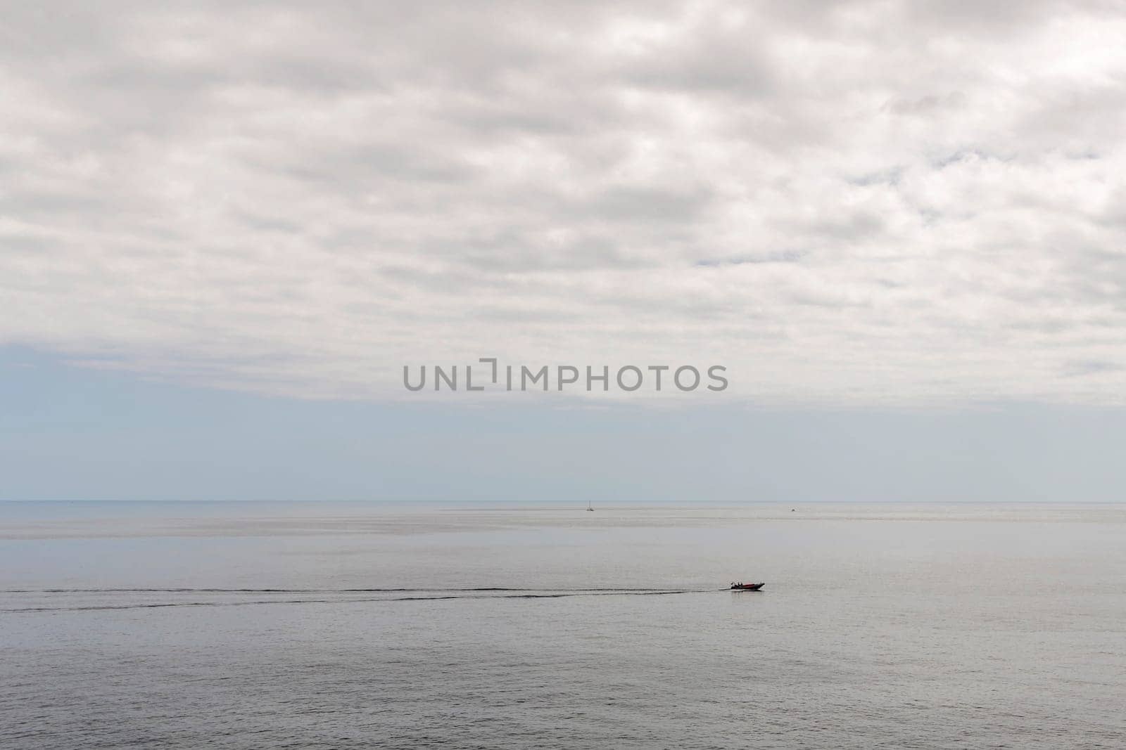 Motorboat crossing the Atlantic Ocean on the island of Madeira, Portugal
