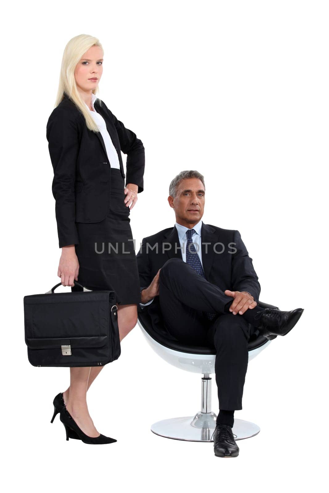 Studio shot of a smart business duo