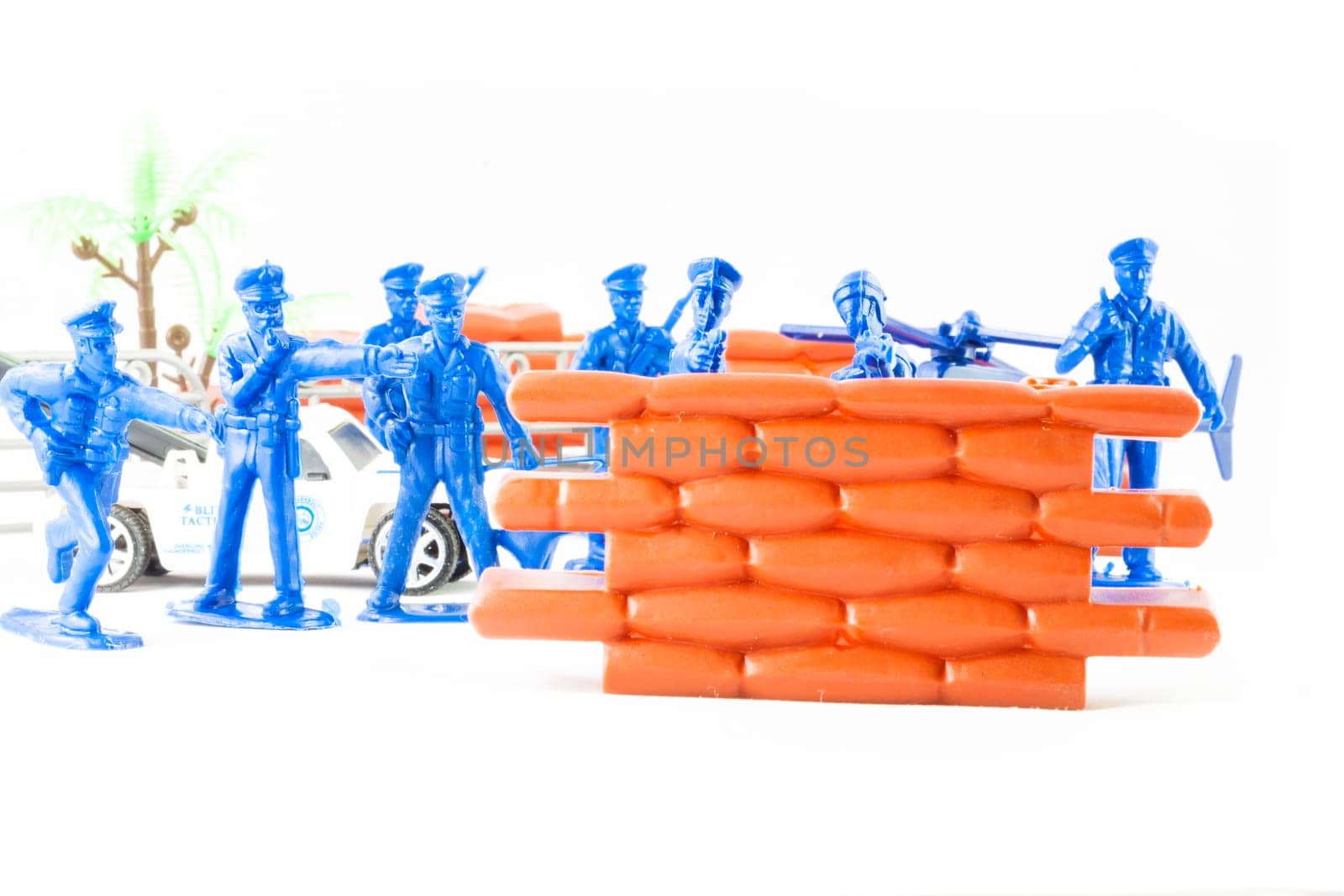 Little toys cop. Elicopter, policeman and policedog.