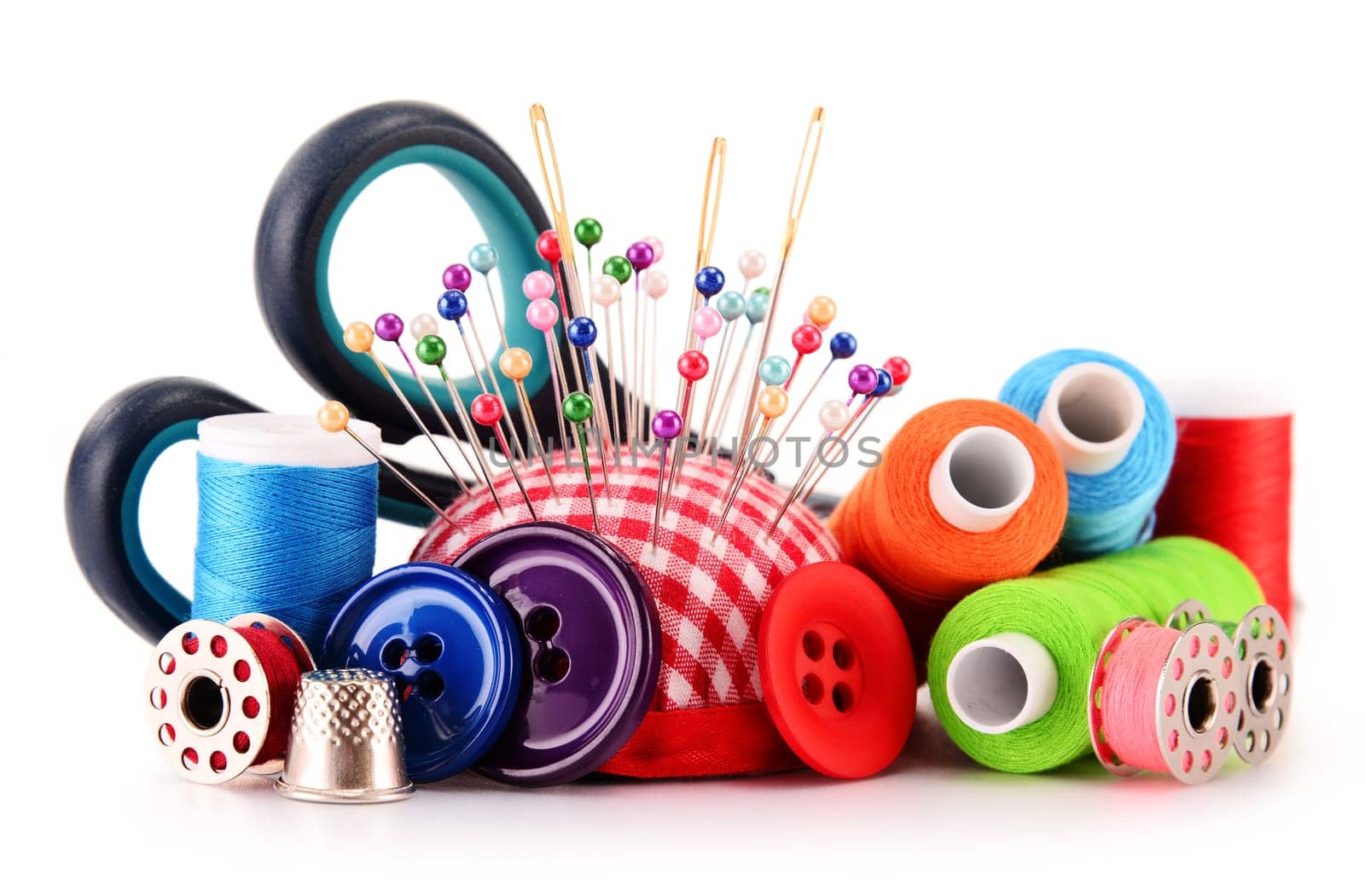 Composition with tailor threads isolated on white background