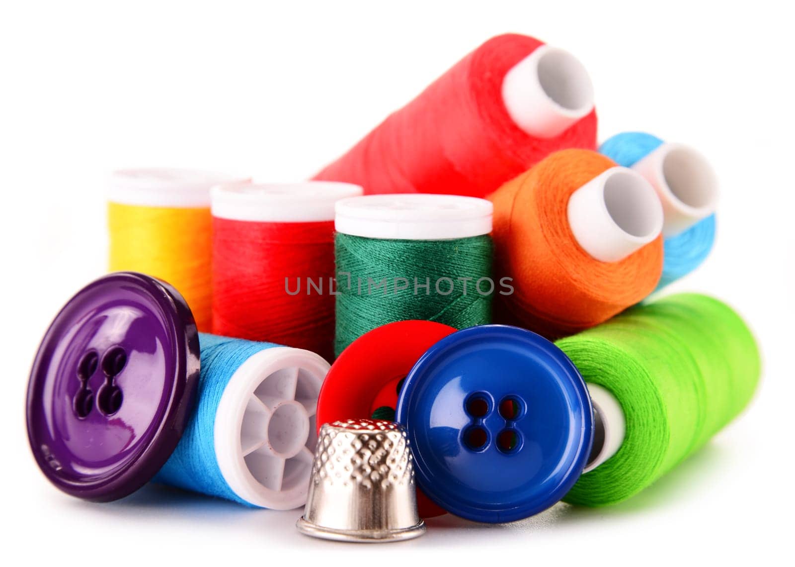 Composition with tailor threads isolated on white background