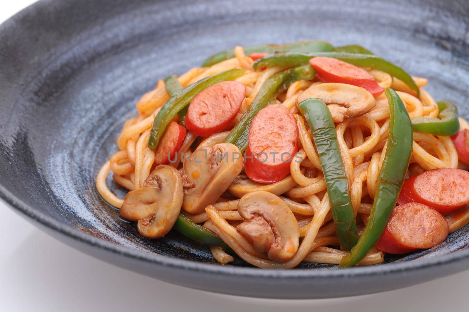 Close up of Japanese Naporitan spaghetti with tomato sauce in a dish