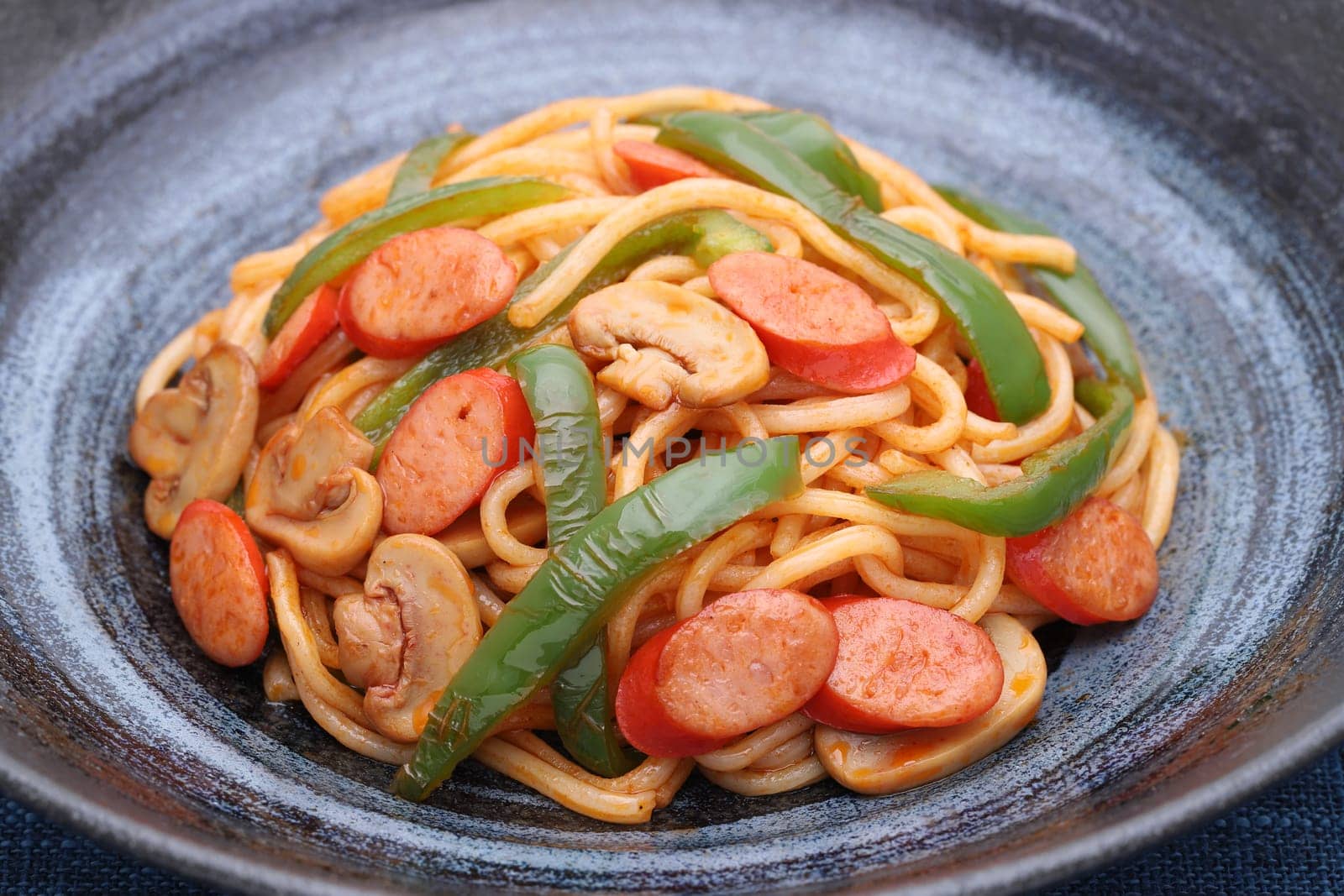 Close up of Japanese Naporitan spaghetti with tomato sauce in a dish