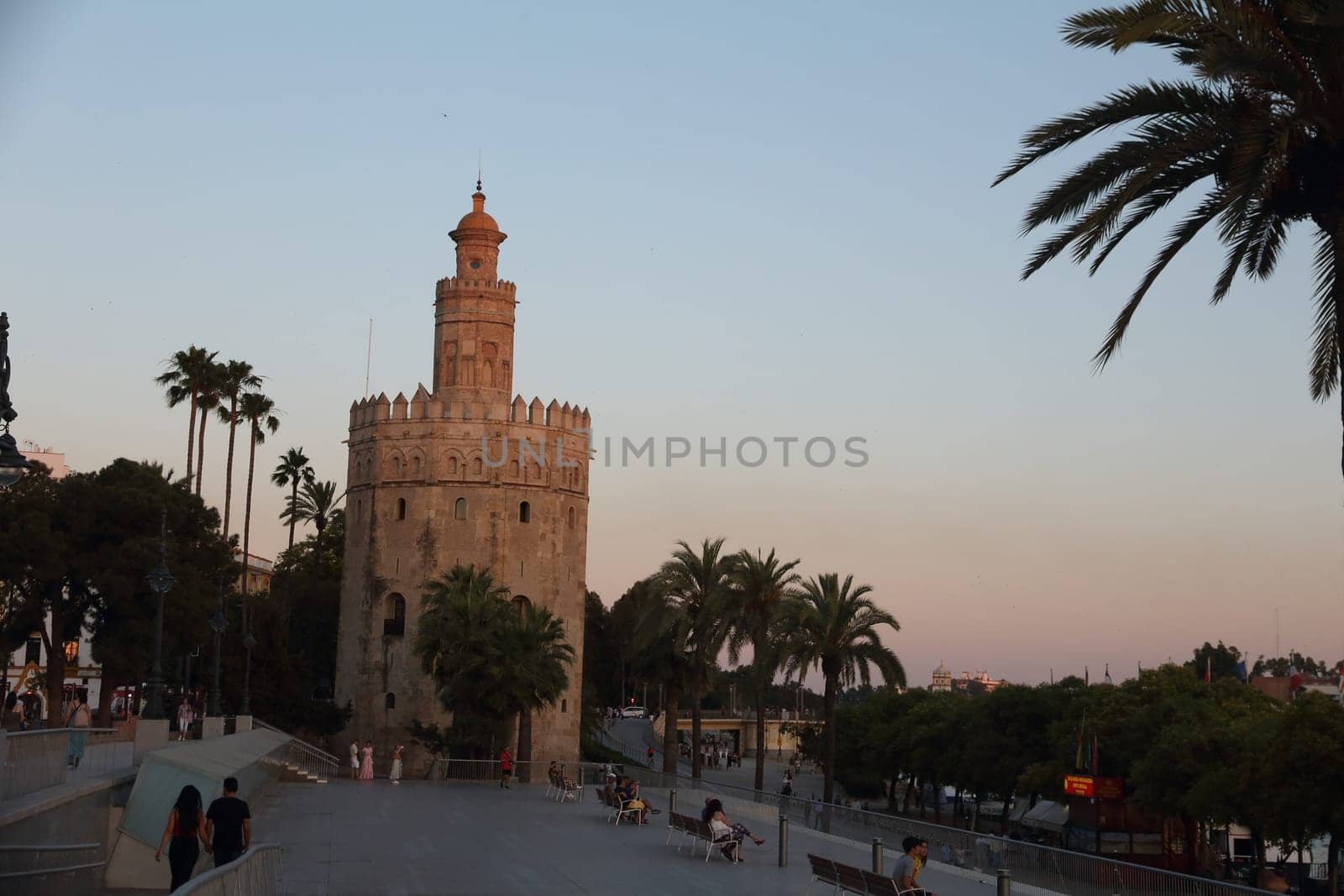 Seville, Spain - June 9 2019: sunset view of the Torre del Oro