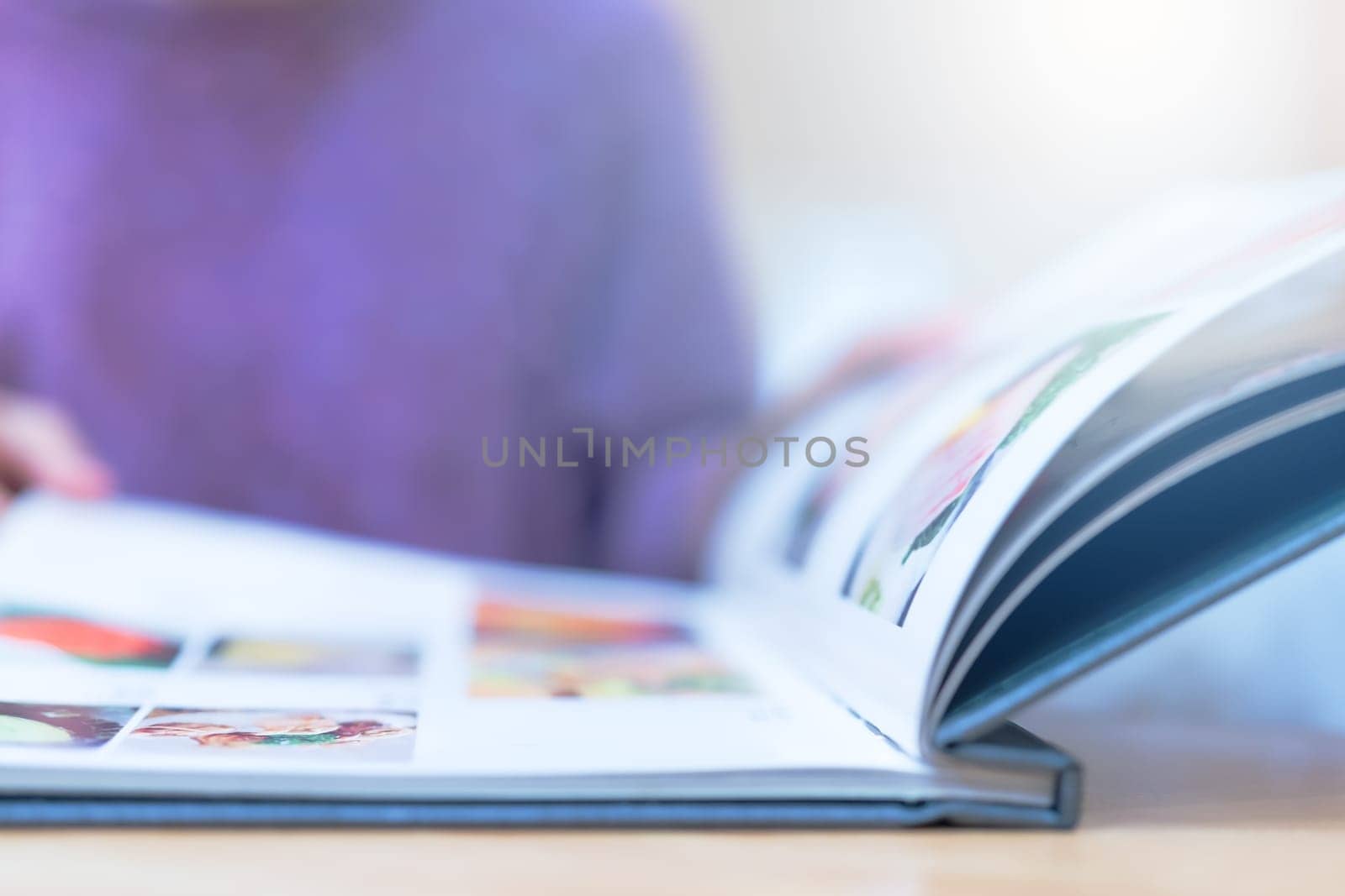 young women looking menu at restaurant, selective focus on menu