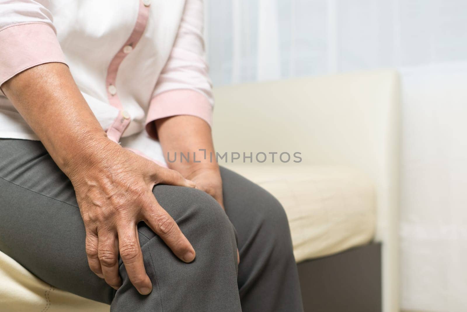 Knee pain of old woman at home, healthcare problem of senior concept