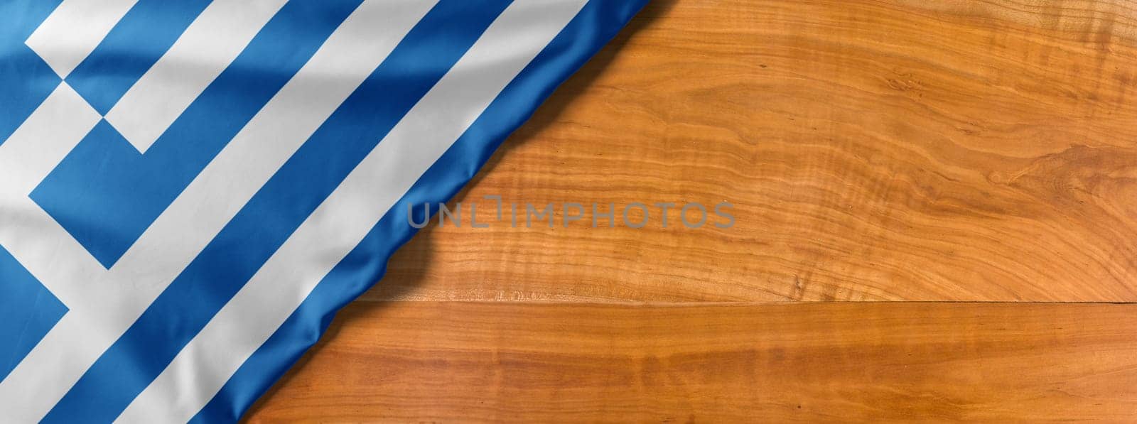 National flag of Greece on a wooden background with copy space