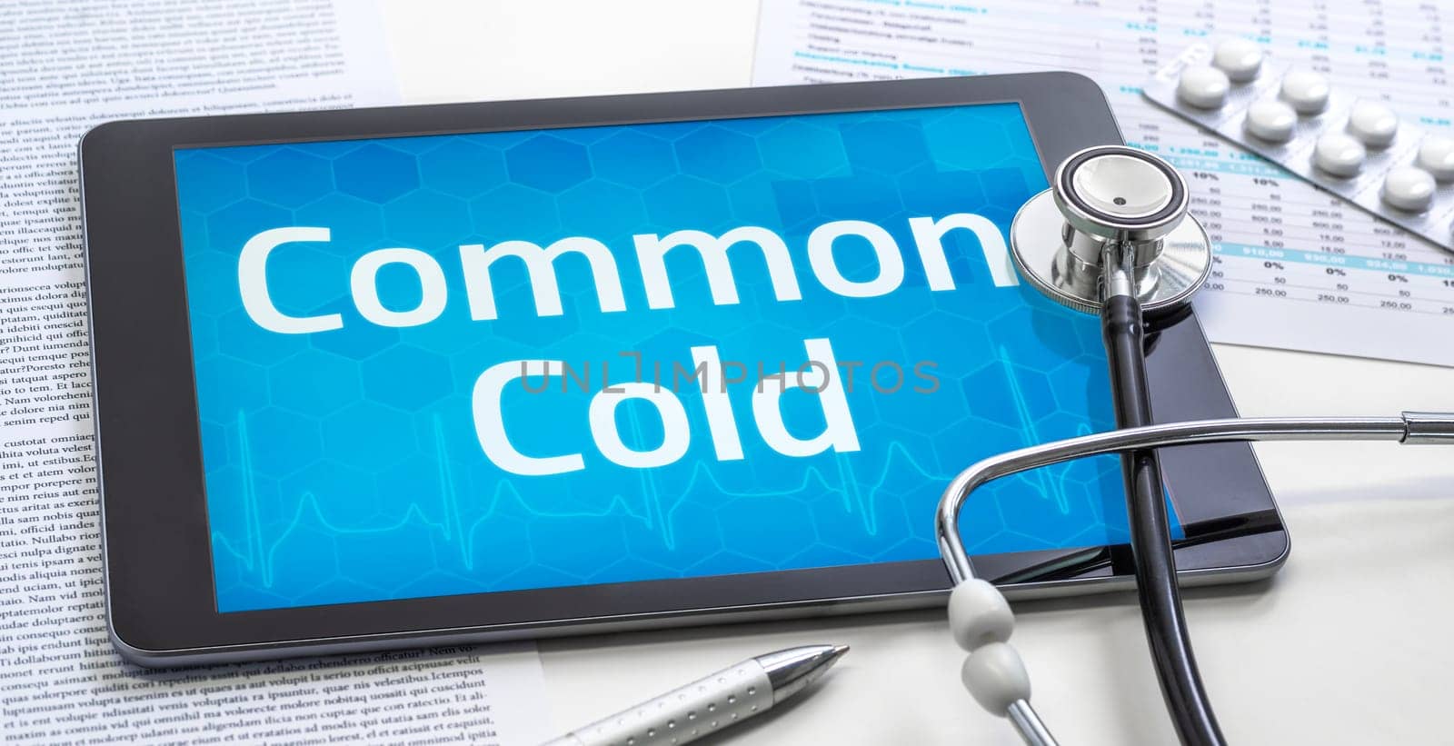 The word Common Cold on the display of a tablet