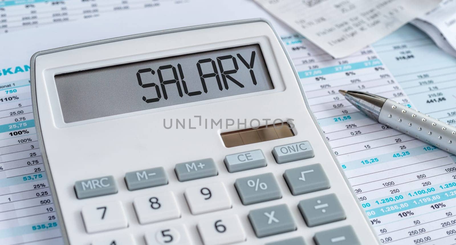 A calculator with the word Salary on the display