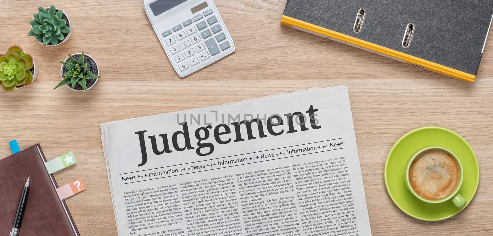 A newspaper on a desk with the headline Judgement