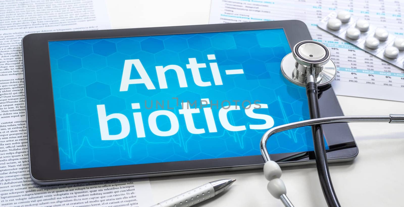 The word Antibiotics on the display of a tablet