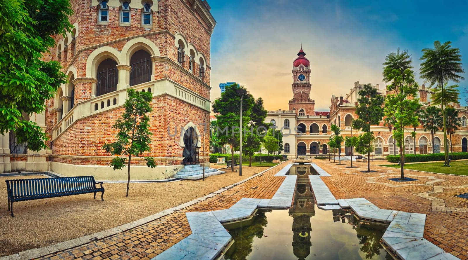 Sunset view from pedestrian bridge of Sultan Abdul Samad Building at Merdeka square, Kuala Lumpur, Malaysia. Panorama