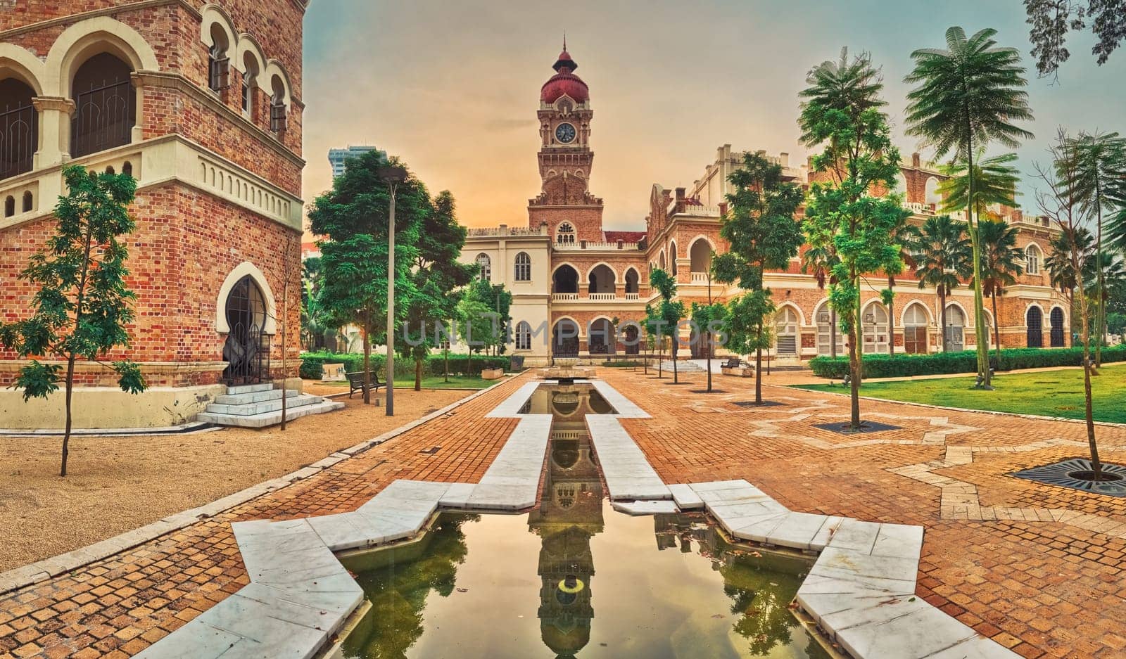 Sunset view from pedestrian bridge of Sultan Abdul Samad Building at Merdeka square, Kuala Lumpur, Malaysia. Panorama