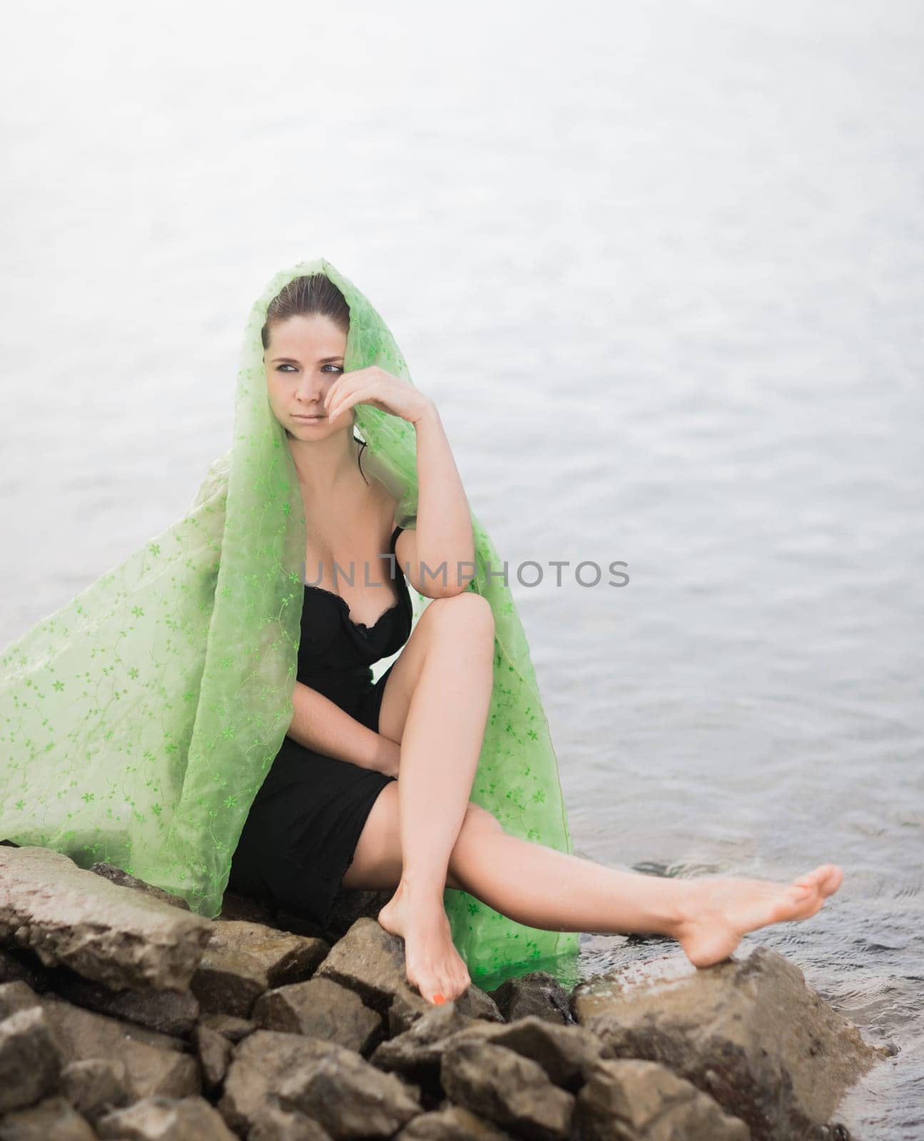 Portrait of a beautiful sexy woman outdoor. Model near the sea