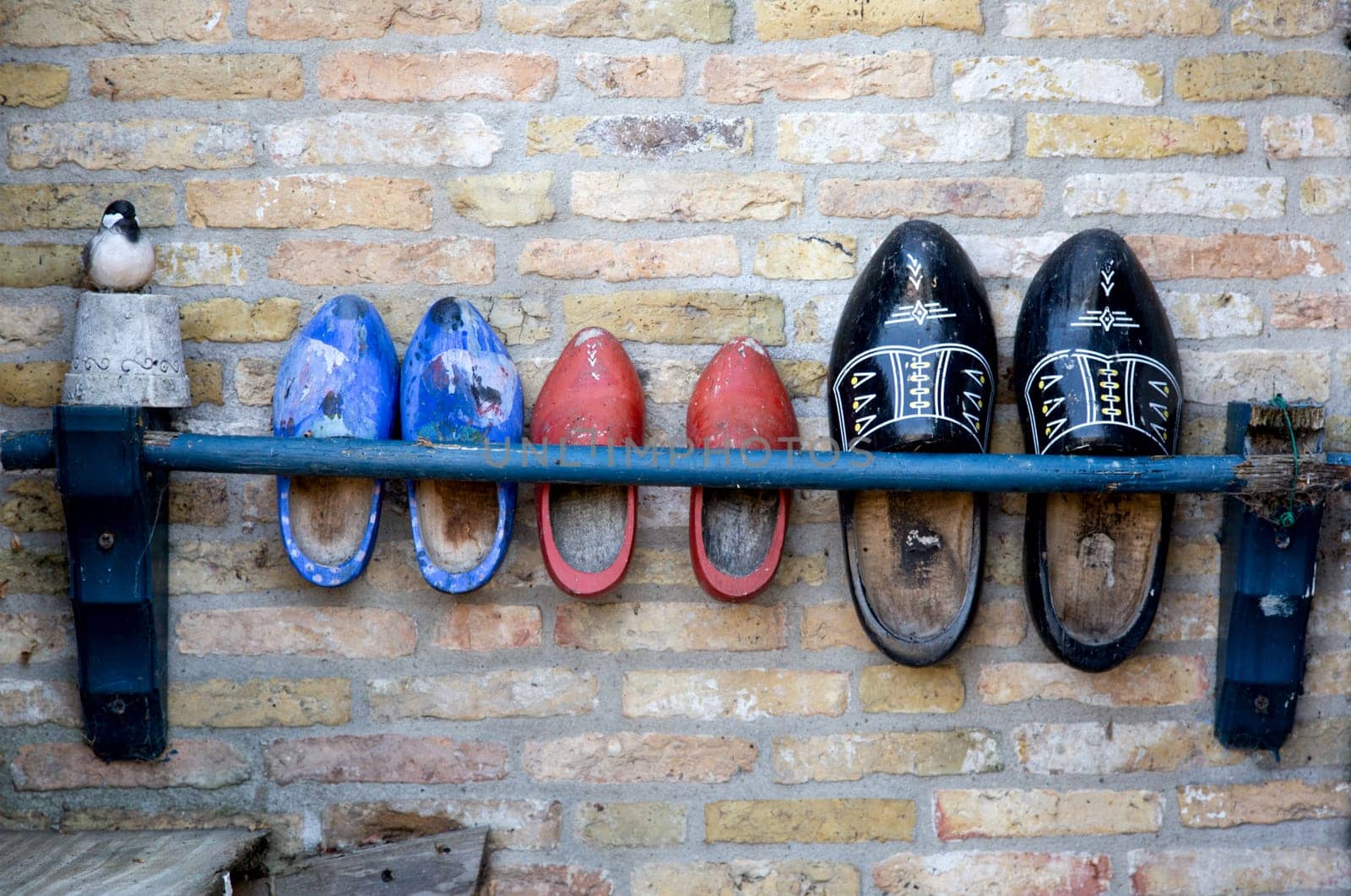 Dutch clogs against a wall..