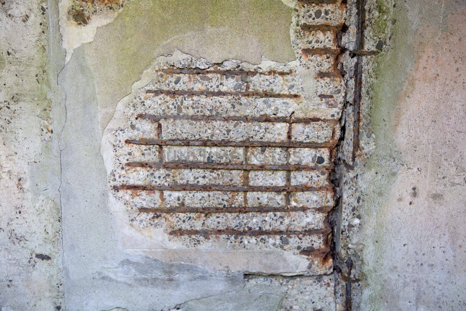 Detail of a broken reinforced concrete wall..