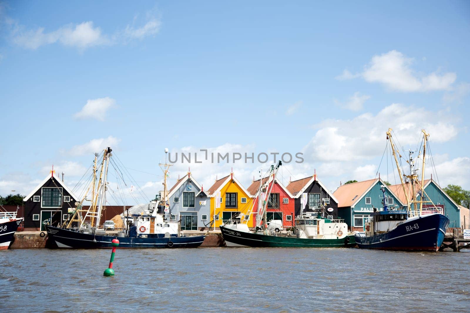 Zoutkamp, Groningen, The Netherlands - July 3 2019, Fishing boats moored at the harbor of Zoutkamp in Groningen, the Netherlands..