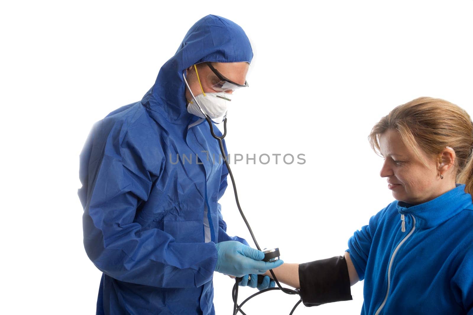 Blood pressure measuring. Doctor and patient. Isolated on white background. Health care.