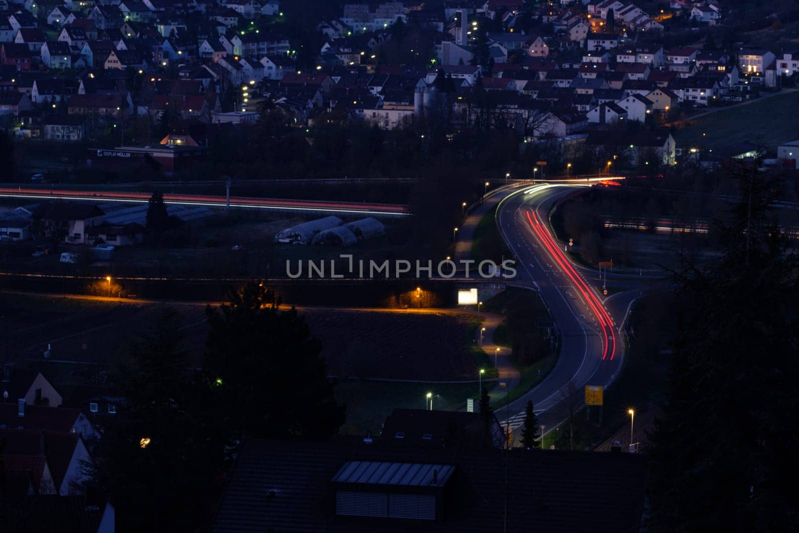 Red and white light trails of cars citiyscape