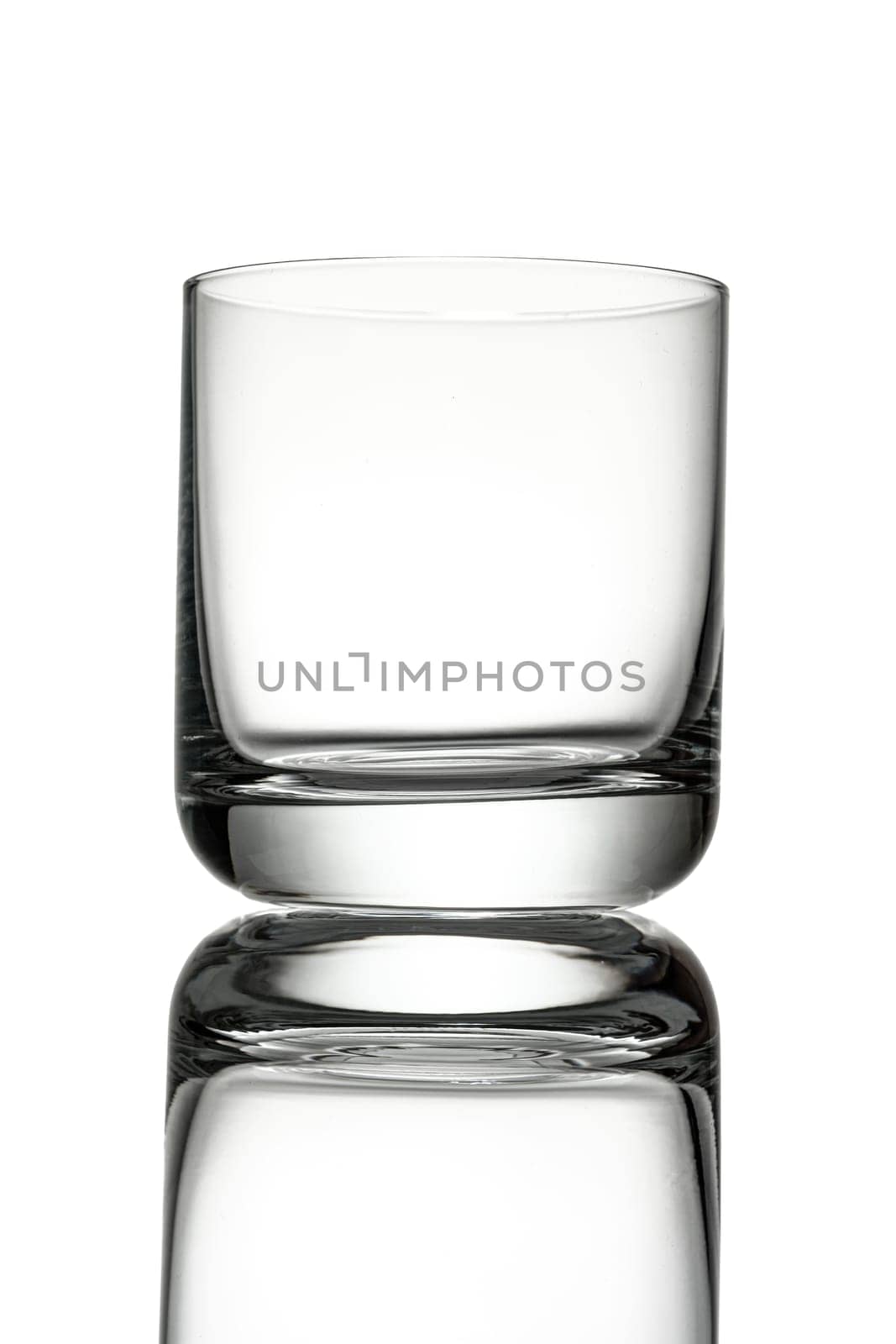 Whisky Tumbler glass white isolated close-up