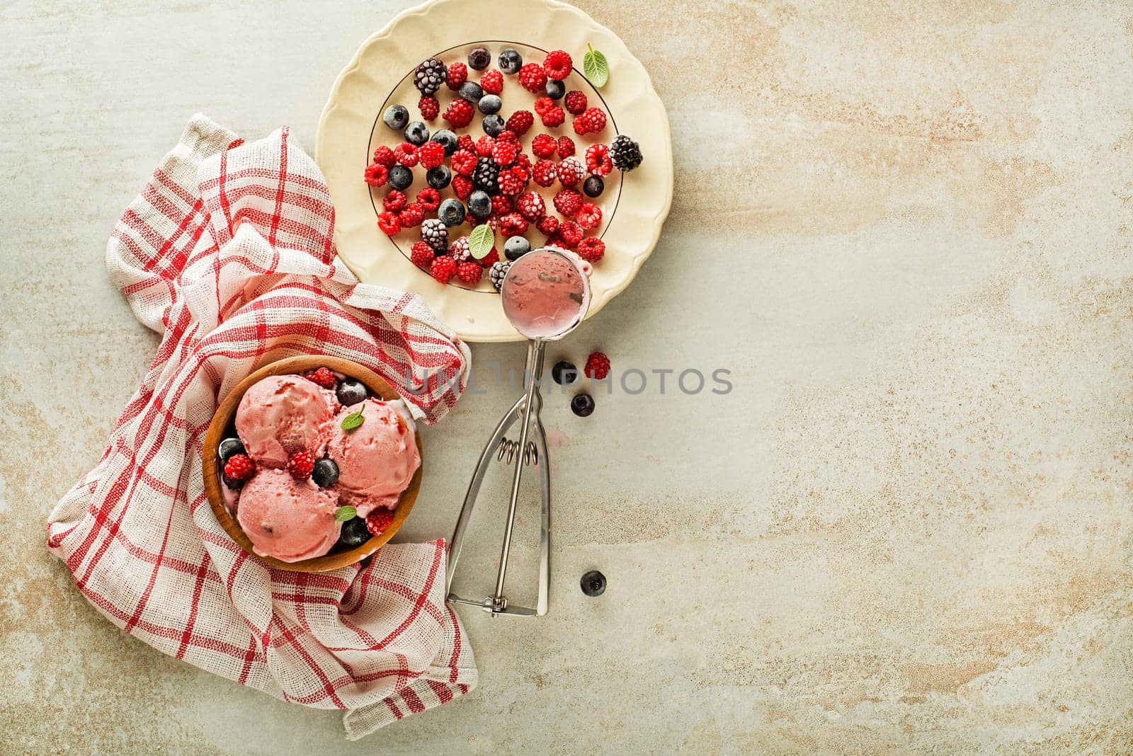 Fresh of soft ice cream or frozen yogurt with berry fruit flavours