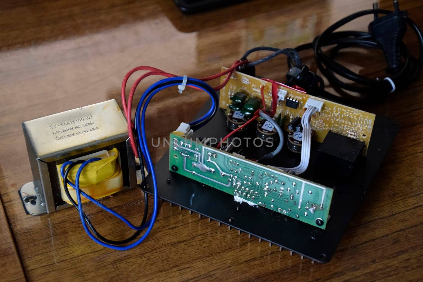 Krasnodar, Russia - April 24, 2020: An internal power amplifier from the computer speaker system microlab solo 2.