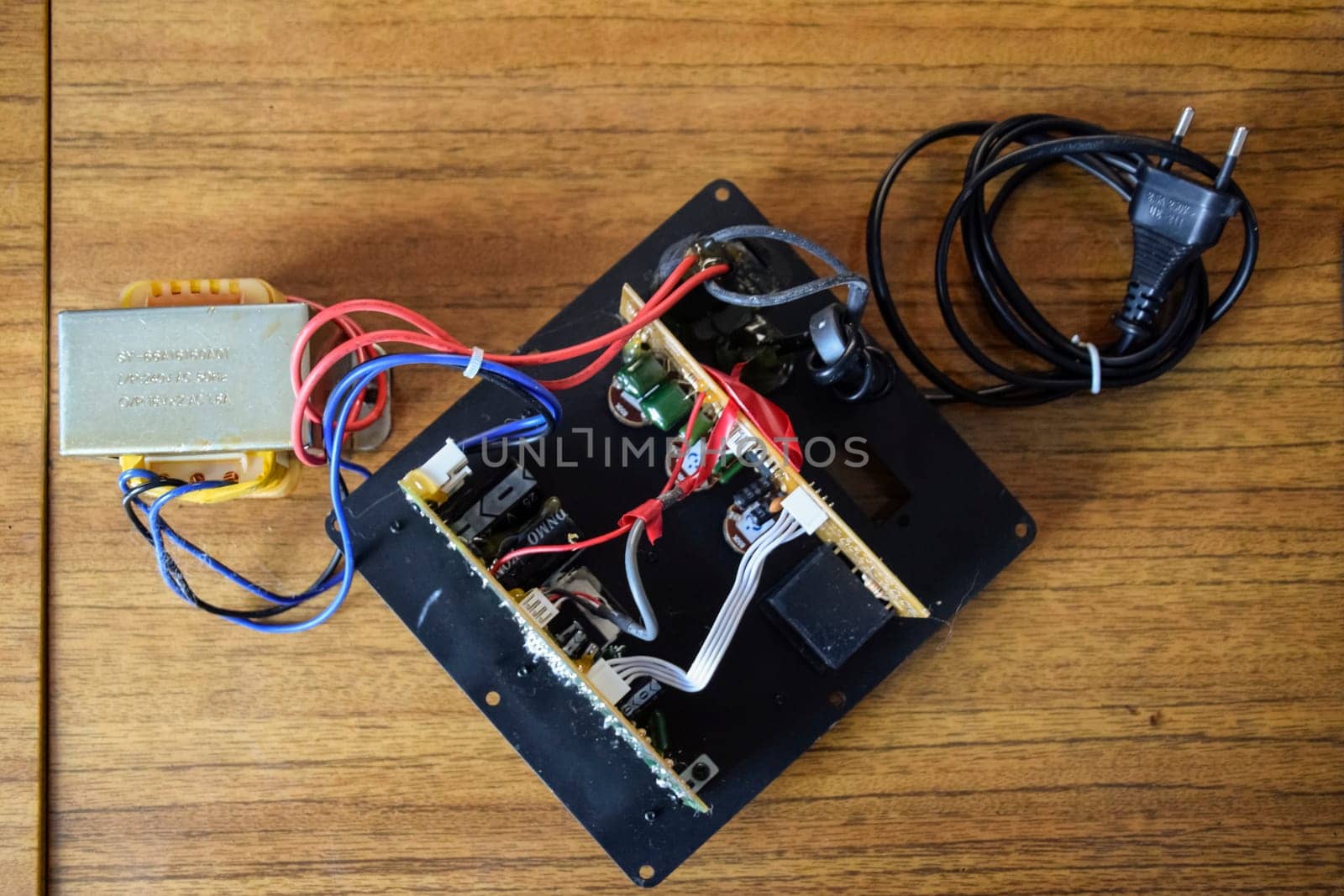 Krasnodar, Russia - April 24, 2020: An internal power amplifier from the computer speaker system microlab solo 2.