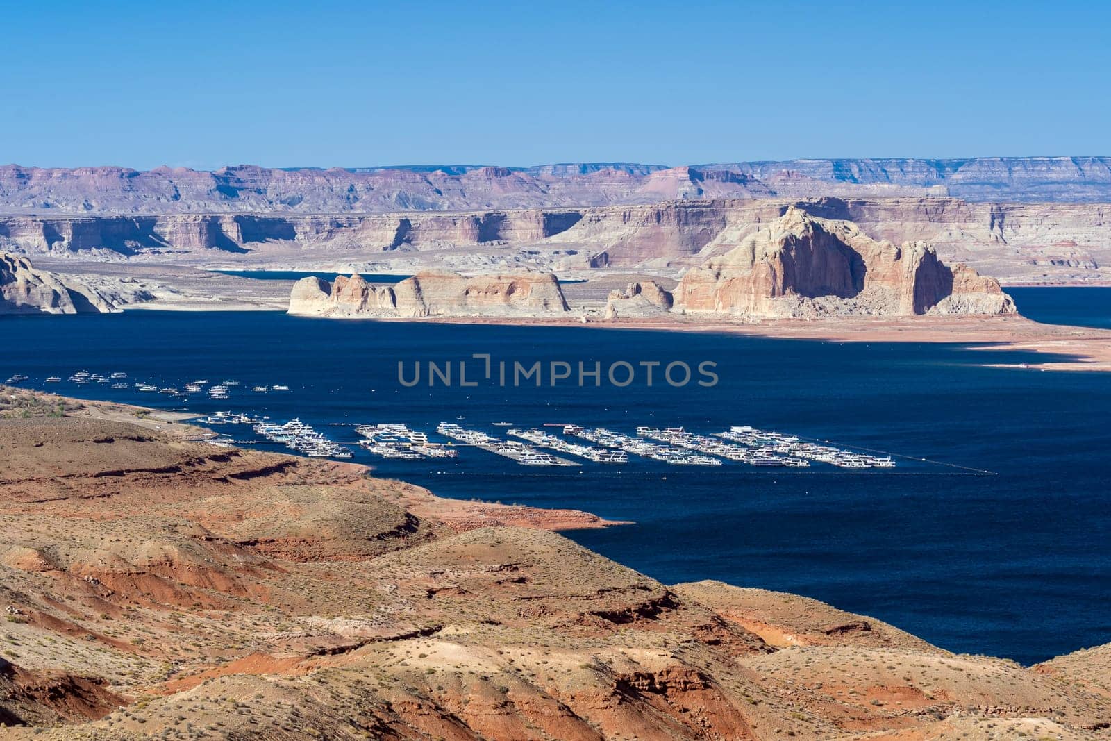 Lake Powell in desert Landscape and yacht Marinas recreation center at Page city Arizona, United States. USA Landmark environmental water resources reservoir sport and recreation concept.