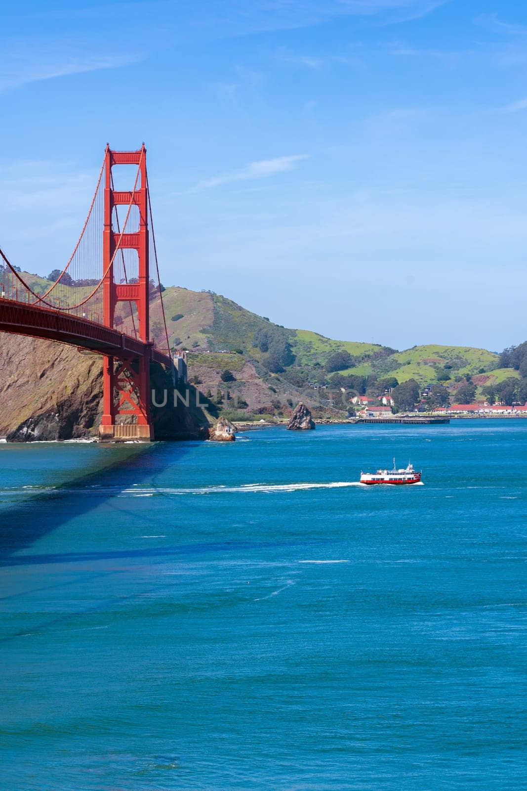 Golden Gate bridge with beautiful blue sky landscape in San Francisco in North California USA West Coast of Pacific Ocean, United States Landmark Travel Destination and cityscape concept.