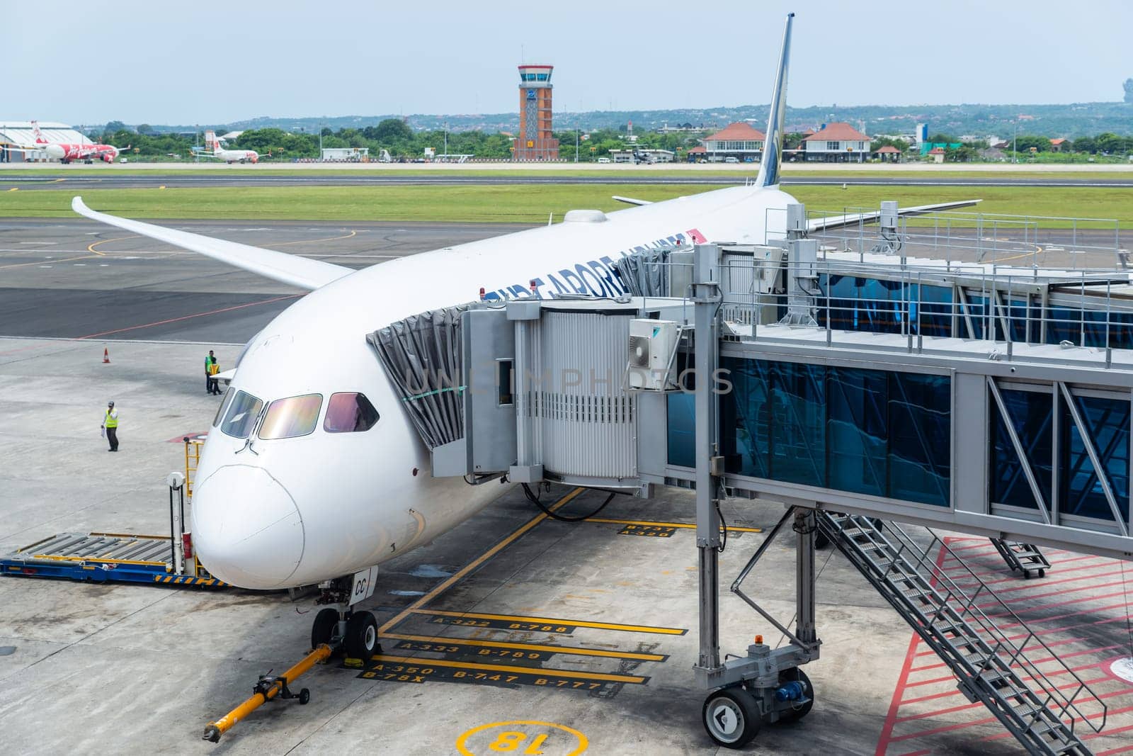 DENPASAR, INDONESIA - CIRCA MARCH 2019: A Singapore Airlines Boeing 787 Dreamliner at Denpasar International Airport also known as Ngurah Rai International Airport, in Bali.