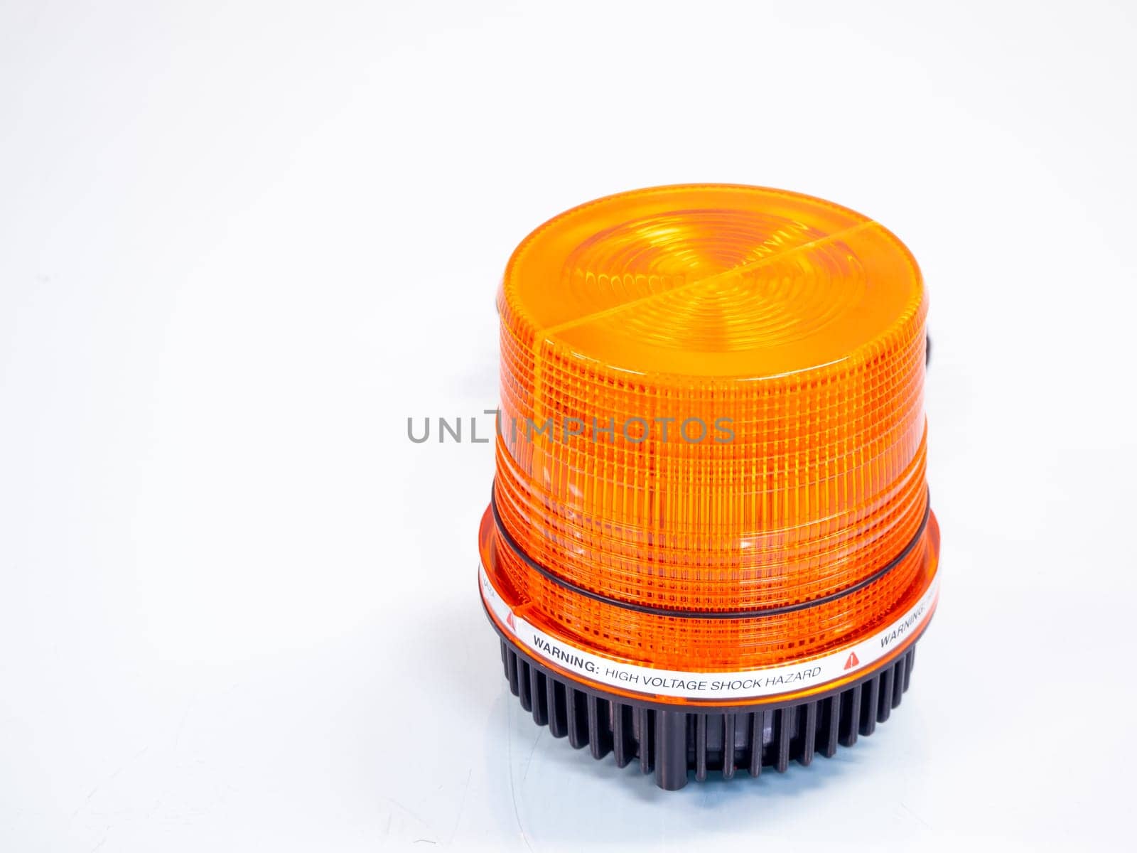 the Orange rotating beacon on white reflective background.