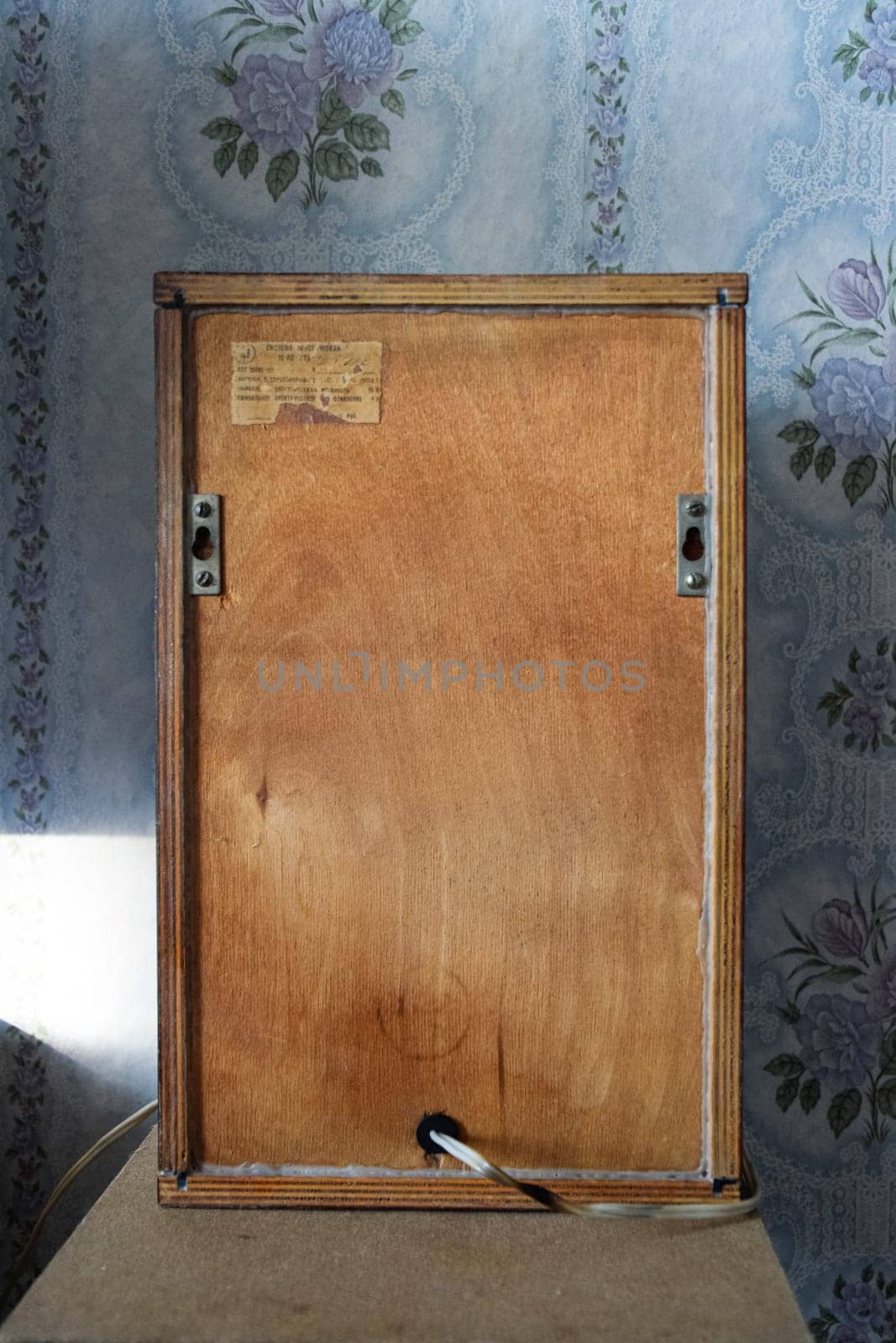 Krasnodar, Russia - April 11, 2020: The back of the shelf speaker system is made of plywood. Column speaker 15AS-208. Vintage Soviet bookshelf acoustics.