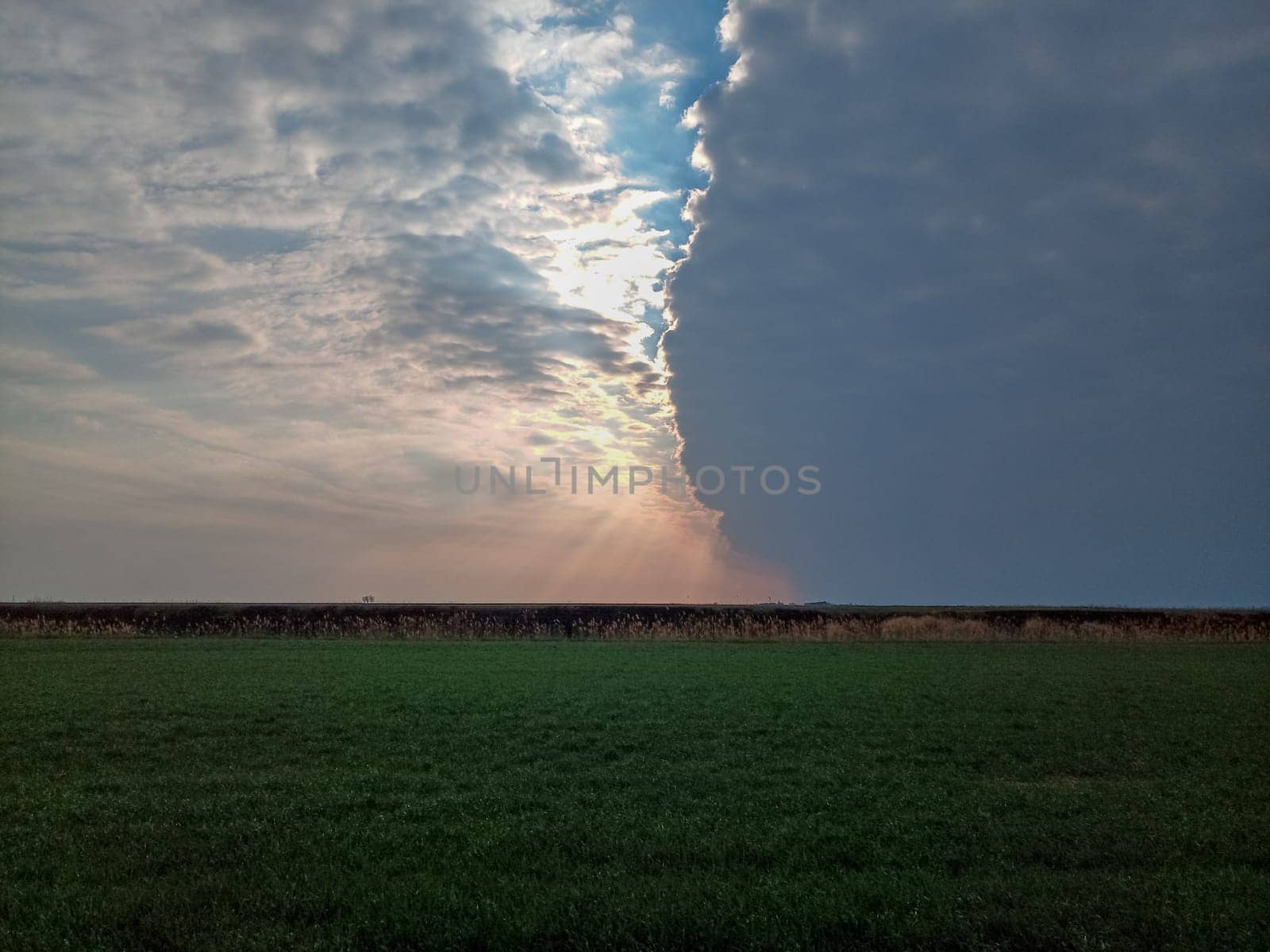 The boundary of atmospheric fronts. The sharp boundary of the clouds in the sky.
